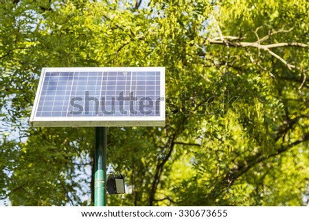 Landscape of solar panels located in a park on a clear day