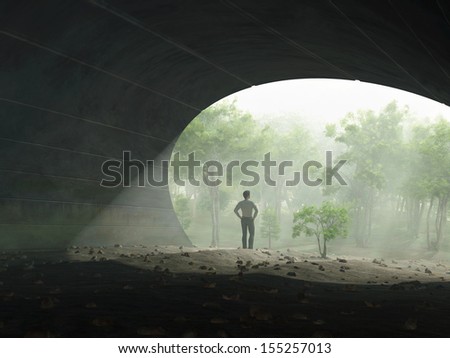 man at the end of tunnel