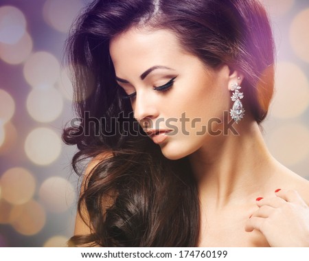 Beautiful woman with evening make-up Jewelry and Beauty Fashion photo Beautiful woman with evening make-up Jewelry and Beauty Fashion photo