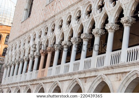 Corner of Doge\'s Palace on San Marco square and bell tower of San Giorgio Maggiore in Venice, Italy