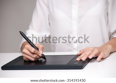 Graphic designer using tablet