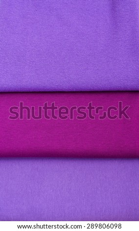 Natural Fabrics. Bright Colourful Fabrics. Knitted fabric is background.