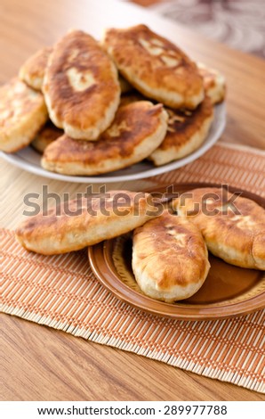 Fried fresh delicious pastry stuffed with cabbage