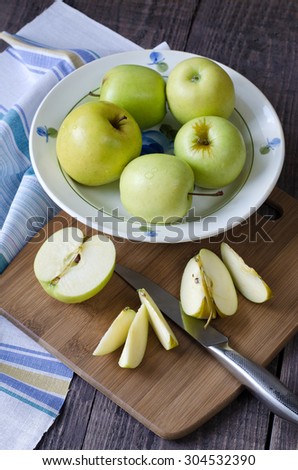 Group of green fresh apples. Apples cut into slices.