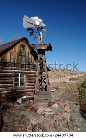 Weathered barn and windmill in the desert, Jerome, Arizona, USA