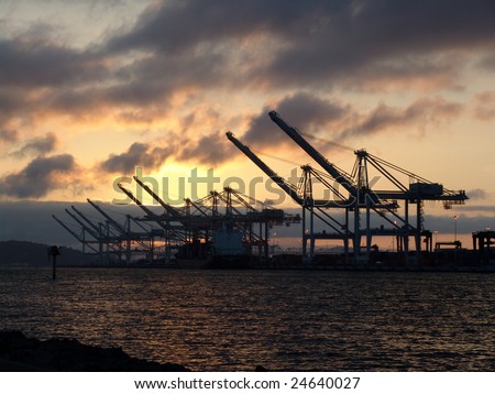 silhouette of Gantry Cranes at dusk, Oakland, California, USA