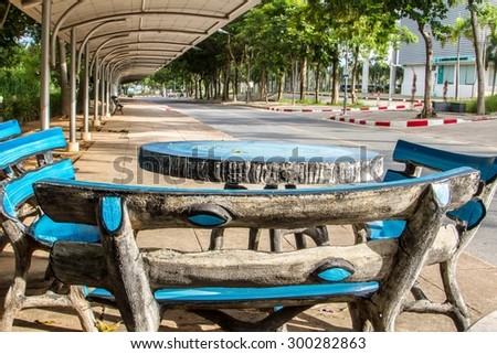 Stone chair for relaxing in the shade. in University