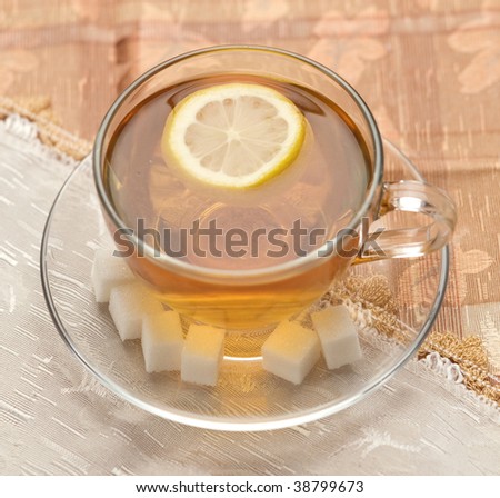 orange-pekoe with a lemon and five pieces of sugar