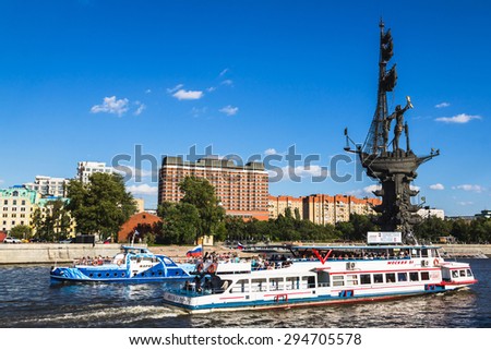 RUSSIA, MOSCOW - JULE 04, 2015: Panoramic view of the monument to Russian emperor Peter the Great and passengers ships, on background of blue sky.