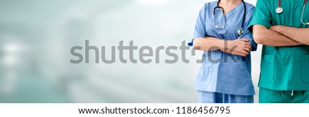 Doctor and nurse in hospital. Healthcare and nursing service.
