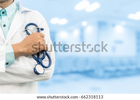 Male Doctor In The Hospital Or Office. Concept Of Hospitalize Staff, Insurance Business or Medical School Student.