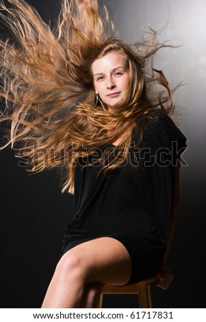 Beautiful long hair in motion created by wind