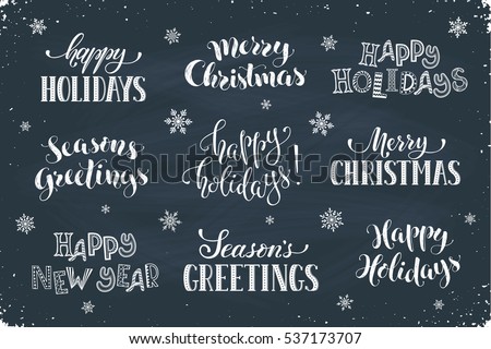 Hand written New Year phrases. Greeting card text template with snowflakes drawn on chalkboard. Happy holidays lettering in modern calligraphy style. Merry Christmas and Season\'s Greetings lettering.