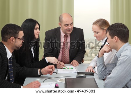 At the meeting, the boss drew attention to one of the girls of his team