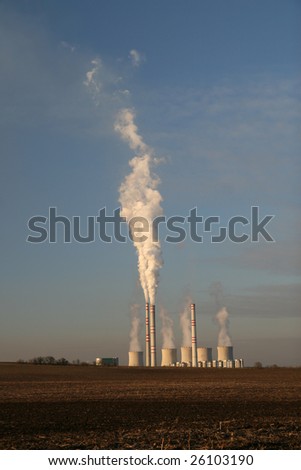 coal plant with smoking chimney