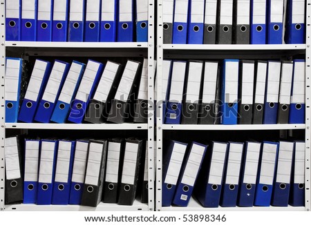 binder folders in shelf