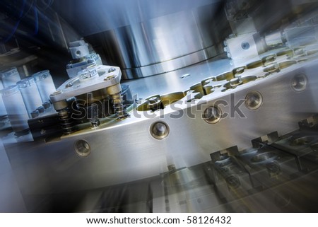 closeup of cnc punching machine with zoom effect