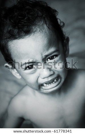 boy crying portrait in rare tone color
