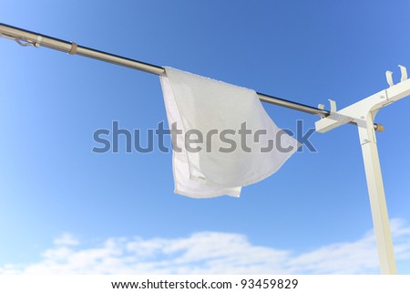Blue sky and white towel