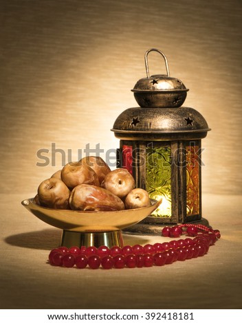 Ramadan lantern with dates and rosary