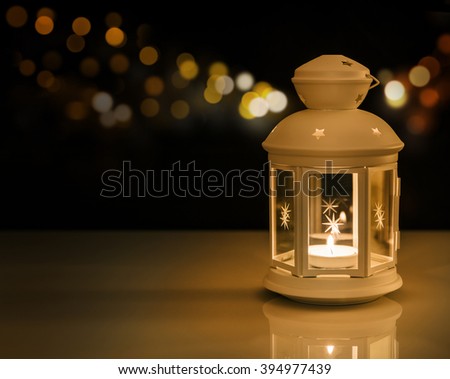 Ramadan lantern with night lights.\
Ramadan mood at night with light decoration in the background.