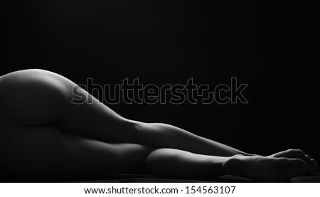 Sexy Woman Lies, Darkness, Light Contours, Wet Skin
