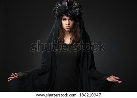 Black Widow. Dark beauty portrait of pale woman.