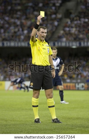 MELBOURNE - FEBRUARY 14: A-league Major Semi Final - Melbourne Victory 4 defeat Adelade United 0. Referee Matthew Breeze gives Cassio a yellow card on February 14, 2009 in Melbourne.