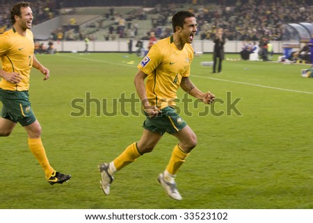 MELBOURNE - JUNE 17: Tim Cahill and Lucus Neill. Australian Socceroos-2 defeat Japan-1 in the 2010 World Cup Qualifying at the MCG (Melbourne Cricket Ground) June 17, 2009 in Melbourne, Australia.
