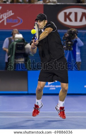 MELBOURNE, AUSTRALIA - JANUARY 23: Andy Roddick(USA)[8] who was defeated by Stanislas Wawrinka(SUI)[19] at the Australian Open on January 23, 2011 in Melbourne, Australia