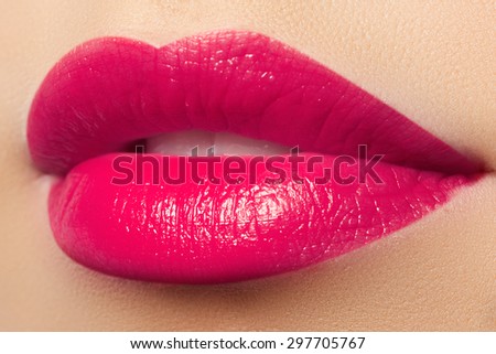 Sexy pink lips make-up. Close-up of beautiful full lips