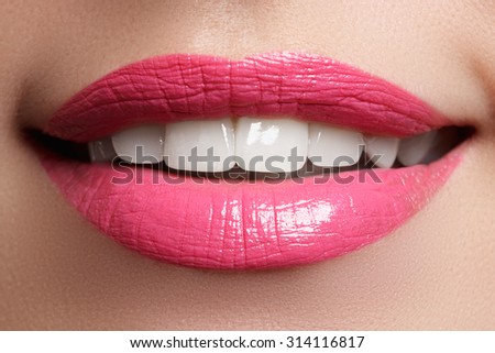 Perfect smile after bleaching. Dental care and whitening teeth. Woman smile with great teeth. Close-up of smile with white healthy teeth