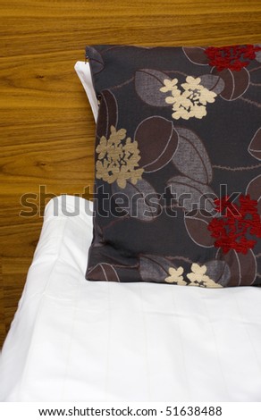 Pillow with floral decoration