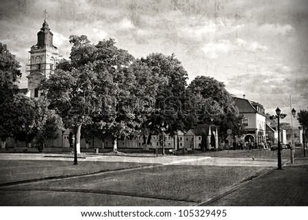 Old style photo of old european town