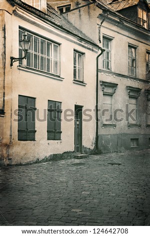 Vintage style photo of old European town street