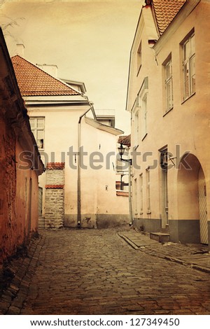 Vintage style photo of old European town street