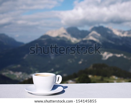 Morning coffee cup with mountain view