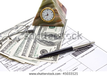 Financial Concept. Money, pen, glasses, clock
