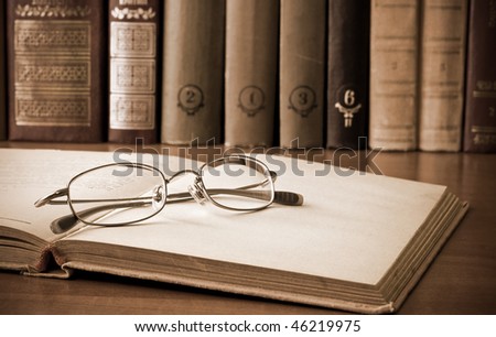 old books and glasses. vintage style