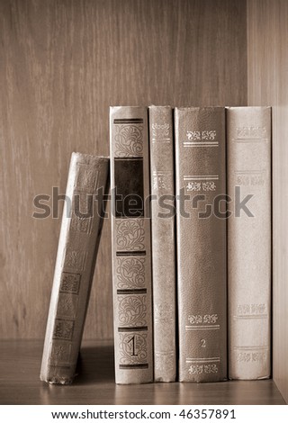vintage photo of old books on the shelf