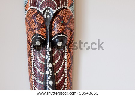Hand crafted African mask on the wall