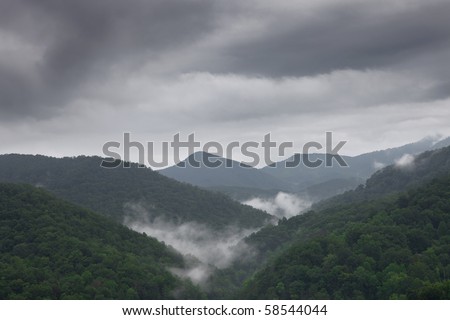 Cloudy and foggy summer mountain landscape. Great Smoky Mountains, Tennessee, USA