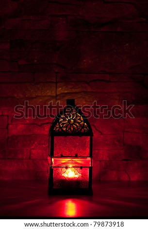 Burning red lantern in the dark
