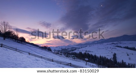Sunrise in winter mountains with moon. Sunrise in Carpathian Mountains, Ukraine