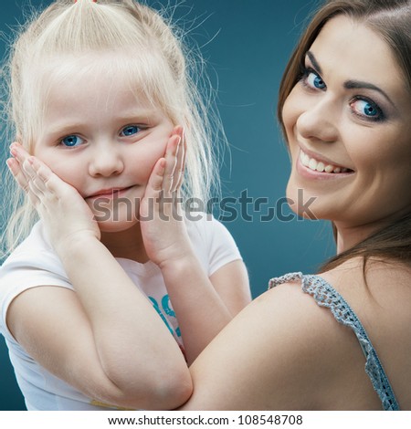 Kid playing isolated portrait. Young mother girl.