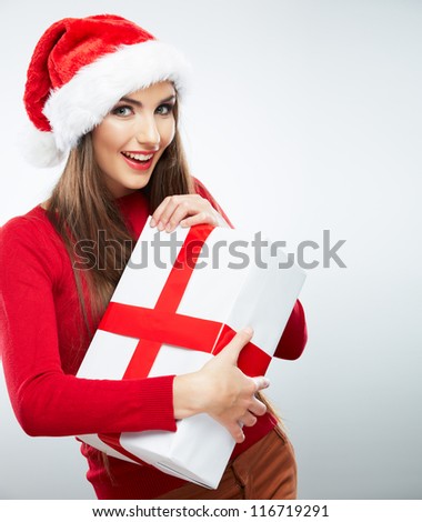 Christmas isolated woman portrait hold red christmas gift. Smiling happy girl on white background.