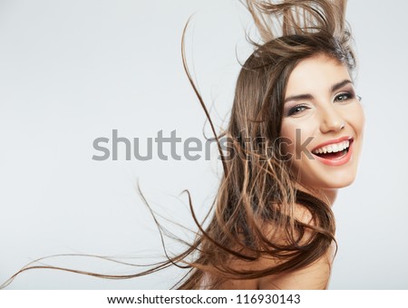 Woman face with hair motion on white background isolated close up portrait.
