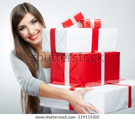 Young woman portrait hold many  gift in christmas color style . Smiling happy girl on white background.