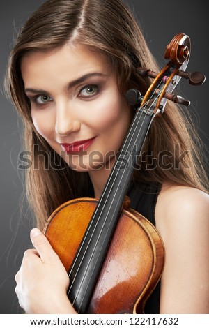 Woman fashion style  portrait with violin music instrument  . isolated. close up female face.