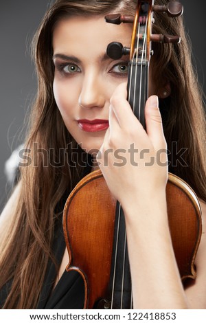 Woman fashion style  portrait with violin music instrument  . isolated. close up female face.